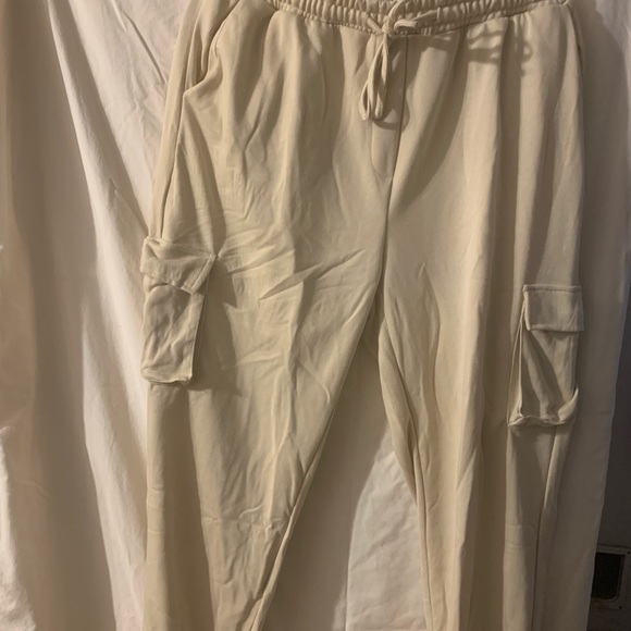 Cargo joggers in cream with drawstring elastic waist and ankles. New in bag. - Picture 3 of 9